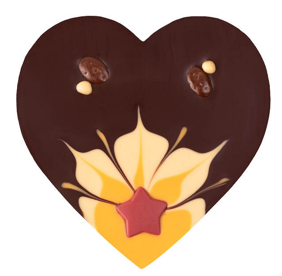 Weihnachtliches Zotter Schokoherz mit Fruchtstern – stimmungsvoll präsentiert für den Festtagsgenuss